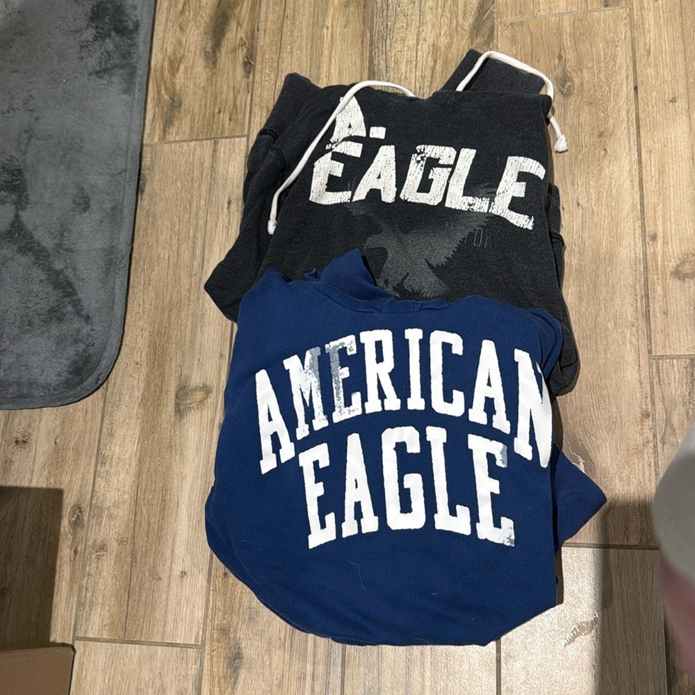 Two men’s large American Eagle Hoodies